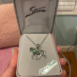 Silver and green horse charm necklace.